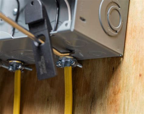 assembling junction box with 3-wire plugs|knockout tool for electrical boxes.